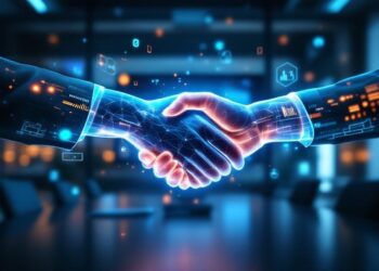 Two professionals shake hands in a futuristic conference room with blue holographic interfaces.